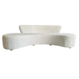 Beige Velvet curved sofa on a white background