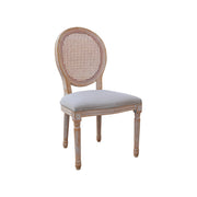 Chair with wicker back and upholstered seat on a white background