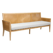 Wooden bench with wicker backrest and white cushion on a white background