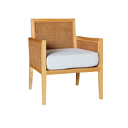 Wooden armchair with wicker backrest and white cushion on a white background