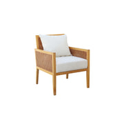 Wooden armchair with wicker backrest and white cushions on a white background