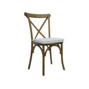 Wooden chair with a white cushion on a white background