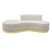 Modern beige sofa with a gold base on a white background