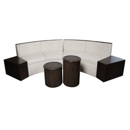 Curved sectional sofa with dark wood bases and white cushions, accompanied by two cylindrical dark wood tables on a white background.