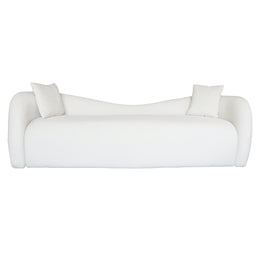 Beige sofa with two cushions on a white background