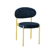 Chair with navy blue seat and backrest on gold metal frame against a white background