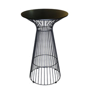 Black wire mesh side table on a white background