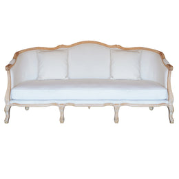A classic French provincial style three-seater sofa with a light natural wood frame and white fabric upholstery, shown against a plain white background.