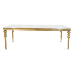 A rectangular table with a glossy white top and ornate gold legs, shown against a plain white background.
