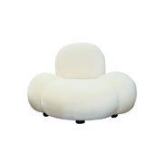 Modern beige Sofa with a cloud-like design on a white background