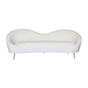 Modern beige sofa with gold legs on a white background