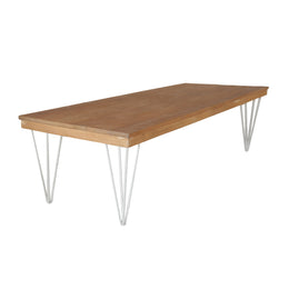 Wooden table with metal hairpin legs on a white background