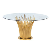 Glass-top table with gold metal base on a white background