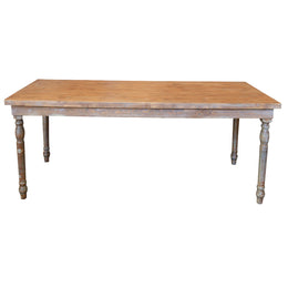 Wooden table with a rustic finish on a white background