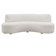 Beige Velvet curved sofa on a white background