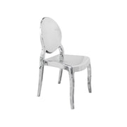 A modern transparent acrylic dining chair with a polished chrome-like finish, featuring a rounded oval backrest and curved legs.