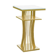 Gold Cocktail table with a glass top on a white background