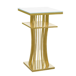 Gold Cocktail table with a glass top on a white background
