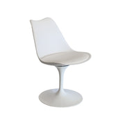 White chair with a tulip base on a white background
