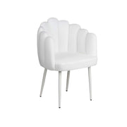 White shell-shaped chair on a white background