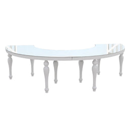 White curved table with glass top on a white background