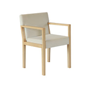 Beige armchair with wooden frame on a white background