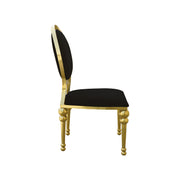 Chair with black seat and backrest and gold frame on a white background