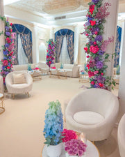 Decorative interior with floral arrangements and Velvet furniture