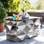 Geometric-patterned outdoor bar with drinks on a patio