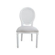 White chair with a decorative backrest on a white background