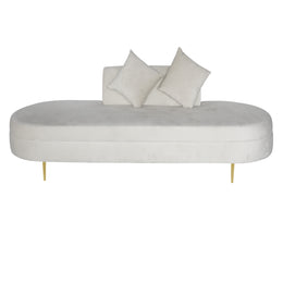A modern bridal sofa  in off-white velvet with two matching throw pillows and slim gold metal legs, shown against a plain white background.