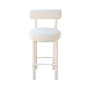 White bar stool with a cushioned seat on a white background