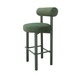 Green bar stool with cushioned seat and backrest on a white background