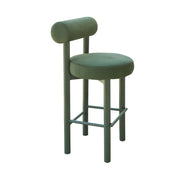 Green bar stool with cushioned seat and backrest on a white background