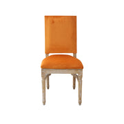 Orange upholstered chair with wooden frame on a white background
