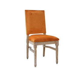 Orange velvet chair with wooden frame on a white background