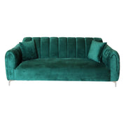 Teal velvet sofa on a white background