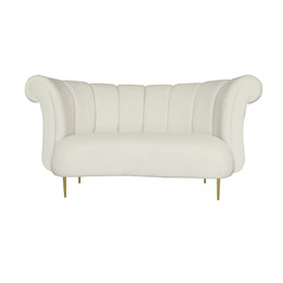 A beige velvet upholstered loveseat with a curved silhouette, vertical channel tufting on the backrest, rolled arms, and slim gold metal legs.