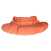 Orange curved sofa on a white background