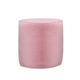 A round, cylindrical ottoman or pouf upholstered in soft pink velvet.