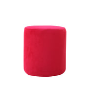 Red velvet ottoman pouf on a white back
