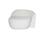 A modern curved beige upholstered sofa with a rounded seat and integrated side support, shown on a plain white background.