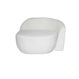 A modern curved beige upholstered sofa with a rounded seat and integrated side support, shown on a plain white background.