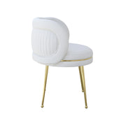 White leather chair with gold legs on a white background