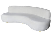 A modern curved beige velvet bridal  sofa in a light off-white fabric, shown on a plain white background.