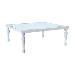 White square table with a glass top on a white background