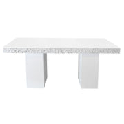 White table with a stone speckled pattern on a white background