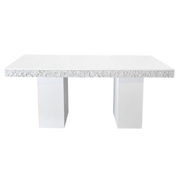White table with a stone speckled pattern on a white background