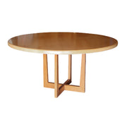 Wooden round table with a unique base design on a white background Moments Rentals