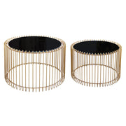 Two gold wire side tables with black circular tops on a white background